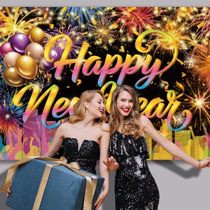 Black and gold New Year party backdrop featuring fireworks and festive balloons