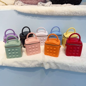 Chic mini studded jelly bucket bags in multiple candy colors with twisted handles
