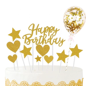 Golden glitter Happy Birthday topper set with sequin balloon and stars on white cake