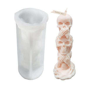 Halloween stack of three skull silicone mold for DIY scented candles on white background