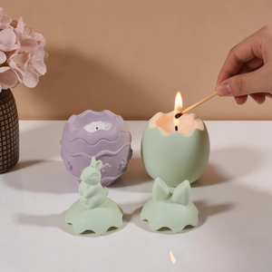 Easter rabbit egg candle jars in lavender and mint green with woven texture resin finish
