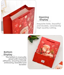 Detail view of large red Santa gift bag showing durable opening and base construction