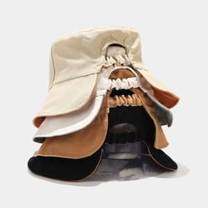 Cappelli a secchiello regolabili in tela da donna in beige, kaki, marrone e nero