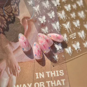 White butterfly nail stickers MS-871 set with pink gradient rhinestone samples