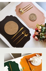 Flat lay of colorful irregular faux leather placemats and coasters with textured finish