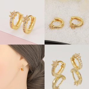 Vistas detalladas de pendientes de aro bañados en oro de 18K con piedras de circón