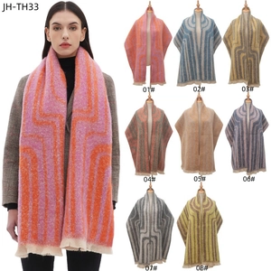 Thick geometric jacquard scarf with mohair texture and color options in pink and orange