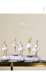 Set of five Nordic ballet girl statues with gold finish and white tutus for decor