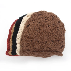 Handmade crochet knit beanie for women featuring floral patterns in five warm colors