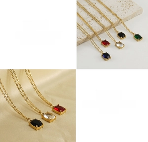 Detailed macro view of square cut zircon pendants on 18K gold plated titanium steel chain