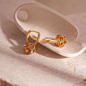 Maillard style geometric sphere huggie earrings with brown crystals and gold plating