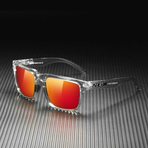 Detail of transparent square sunglasses frame with orange polarized lenses and logo