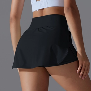 Detail of high-waisted black athletic tennis skirt showing elastic fabric and seams