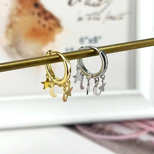 Chic S925 star and moon dangle hoop earrings in polished gold and silver finishes