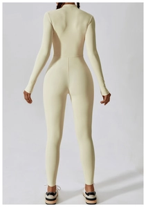 Rear view of a light beige high-stretch long sleeve yoga jumpsuit with a slim fit design