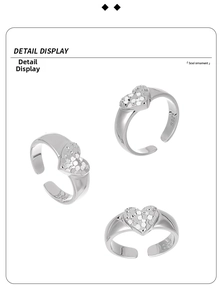 Detailed macro view of S925 sterling silver heart ring with geometric textured surface