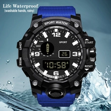 Waterproof digital sports watch with square black case and blue silicone strap in splashing water