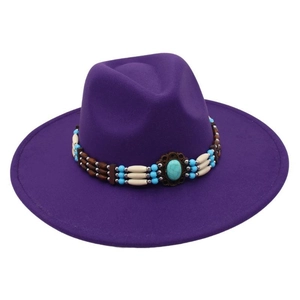 Close-up of ethnic style wool fedora hat with turquoise gemstone and beaded headband