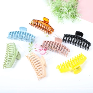 Glossy oversized 13cm shark hair claws in assorted bright colors on a clean background