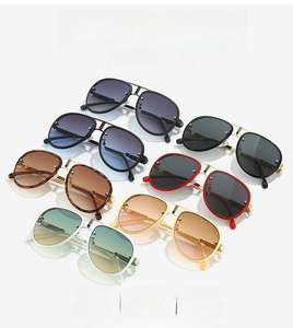 Matrix display of aviator sunglasses in various colors with metallic frames and resin lenses