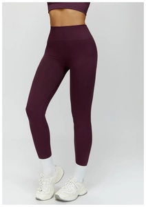 Detail of high-waist yoga leggings with wide ribbed waistband for tummy control