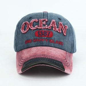 Vintage color-blocked baseball cap with OCEAN embroidery and navy washed denim finish