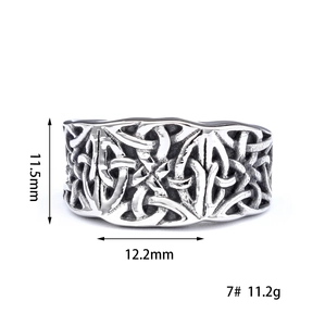 Detail view of Celtic knot ring showing 11.5mm width and intricate braided texture