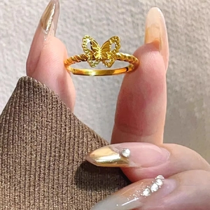 Elegant gold butterfly open ring with hollow design and twisted rope band texture