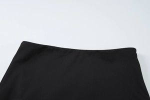 Close-up of the black high-waisted elastic waistband on a slim-fit summer skirt set