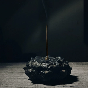 Zen style lotus shaped incense burner made of dark ceramic for stick incense aromatherapy