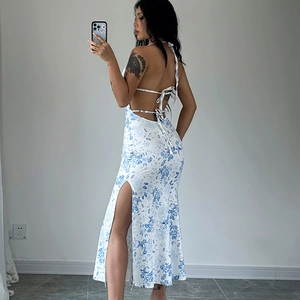 Floral backless maxi dress with side slit and tie-back detail for summer beach wear