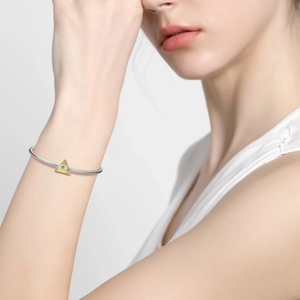 925 sterling silver snake chain bracelet with golden All-Seeing Eye pendant on a wrist