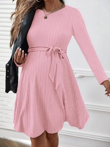 Elegant pink long sleeve maternity A-line dress with ribbed knit texture and waist tie