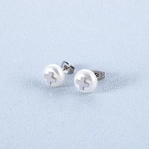 Minimalist pearl stud earrings with silver cross detail and stainless steel finish
