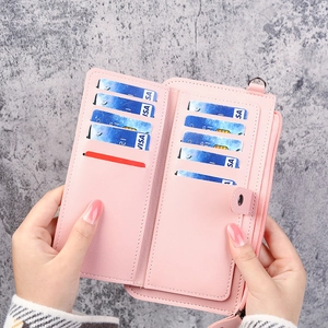 Pink pebbled leather long wallet featuring multi-card slots and zippered coin pocket
