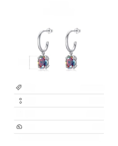 Detail of S925 sterling silver earrings featuring 7x9mm oval colorful zircon stones