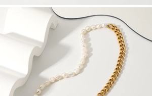 Detail of freshwater pearl and gold Cuban chain necklace with an OT toggle clasp