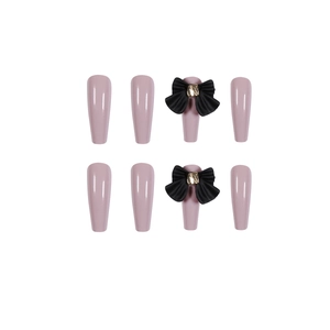 Long ballerina press-on nails in lavender purple with 3D black bow decoration