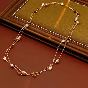 Collana doppia con occhio di tigre e perle su catena dorata in stile vintage