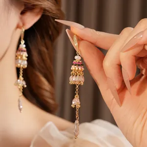 Bohemian pearl tassel drop earrings with pink crystals and zircon in gold finish