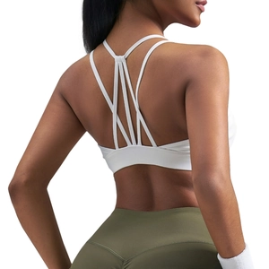 Soutien-gorge de sport blanc à bretelles croisées pour le fitness et le yoga