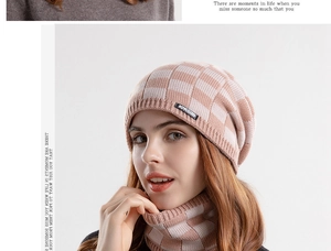 Detail of pink and white checkered knit beanie and matching scarf set for women