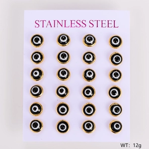 Twelve pairs of gold stainless steel Turkish evil eye stud earrings on a display card