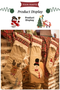 Detail of burlap Christmas stockings with Santa, snowman and reindeer on a fireplace