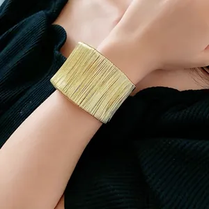 Minimalist wide gold wired open bangle bracelet for women with modern textured finish