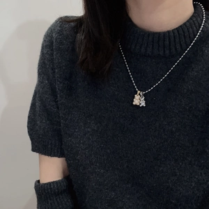 Titanium steel chain necklace featuring sparkling gold and silver micro-pave bear pendants
