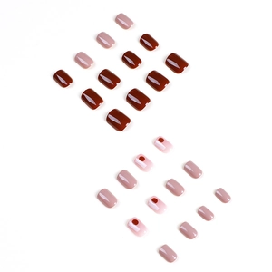Short cherry graffiti press-on nails in deep brown and rose pink glossy finish