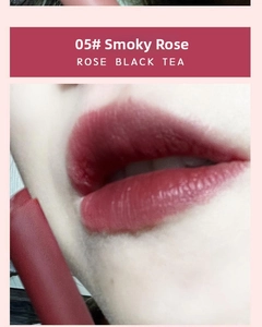 Macro shot of Rose Black Tea matte velvet lipstick shade 05 on smooth lips