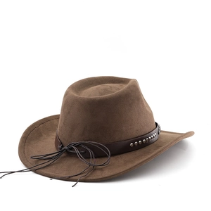 Detail of dark brown suede cowboy hat featuring leather band with silver metal studs