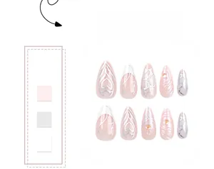 Detail view of 3D almond press-on nails with silver heart patterns and marble texture